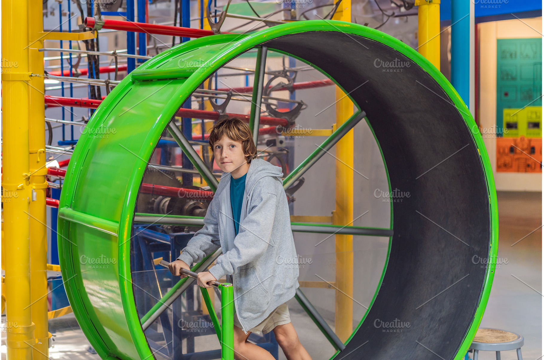 Teenage boy running inside a giant, a Sports & Recreation Photo by Elizaveta Galitskaya