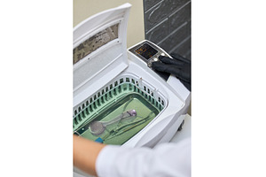Disinfecting beauty salon tools in, a Health & Medical Photo by wip3out