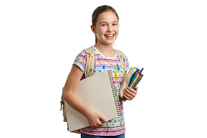 Girl Holding School Supplies, a School & Education Photo by CREATIVEDEF