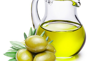 Green natural olives and decanter with olive oil isolated on a w, a Food & Drink Photo by Volff