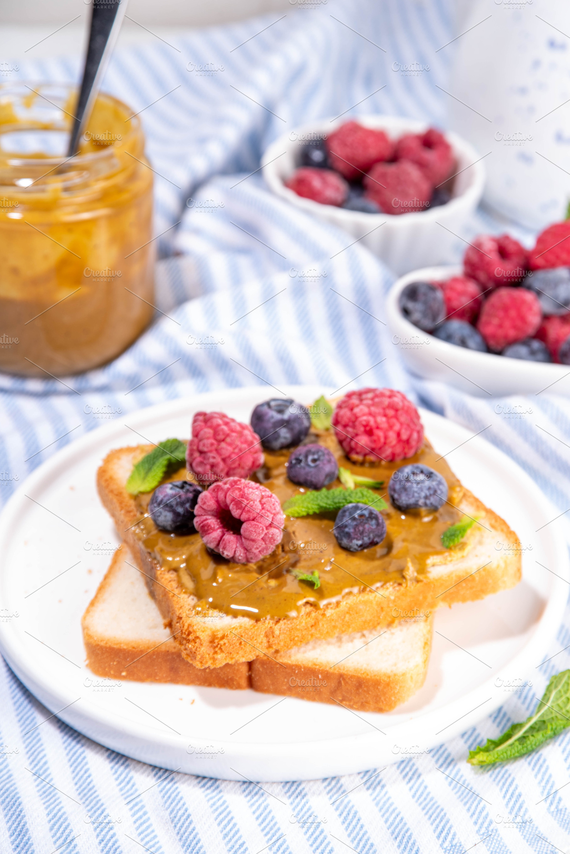 Summer breakfast delicious sandwiches with pistachio butter spre, a Food & Drink Photo by Rimma