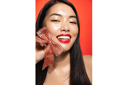 Beauty woman with holiday ribbon, a Beauty & Fashion Photo by ringsaroundme