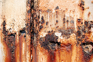 Badly rusted corrugated iron wall