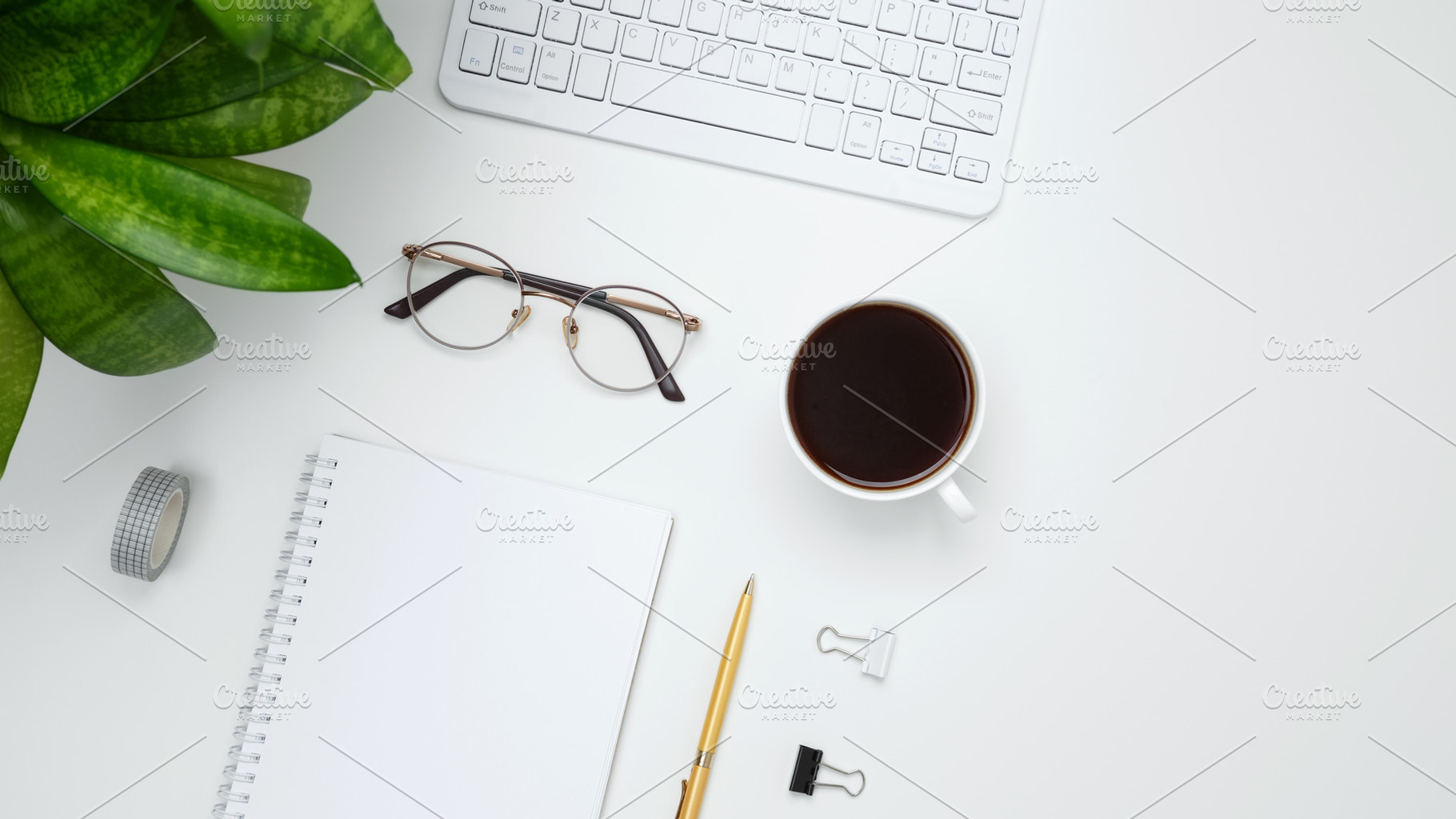White workspace with cactus, green plant, eyeglasses, and coffee mug for produc, a Photo by matucha