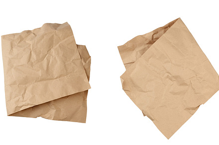 folded blank brown kraft paper sheet, an Abstract Photo by ndanko