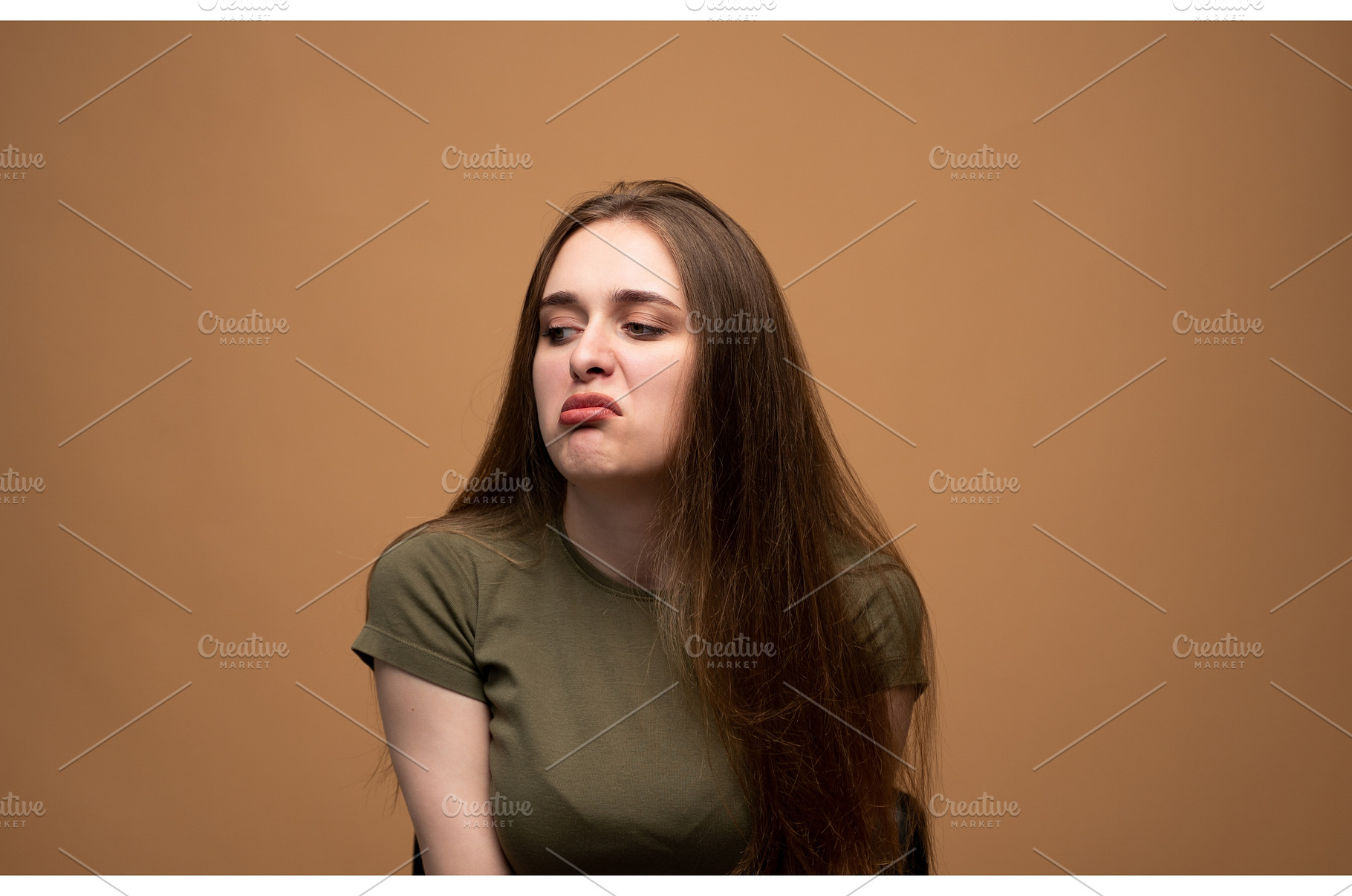 Young woman showing strong disgust, a Person Photo by volodymyrshtun13795