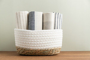Stack of cotton kitchen towels in wi, a Photo by Edalin's Store