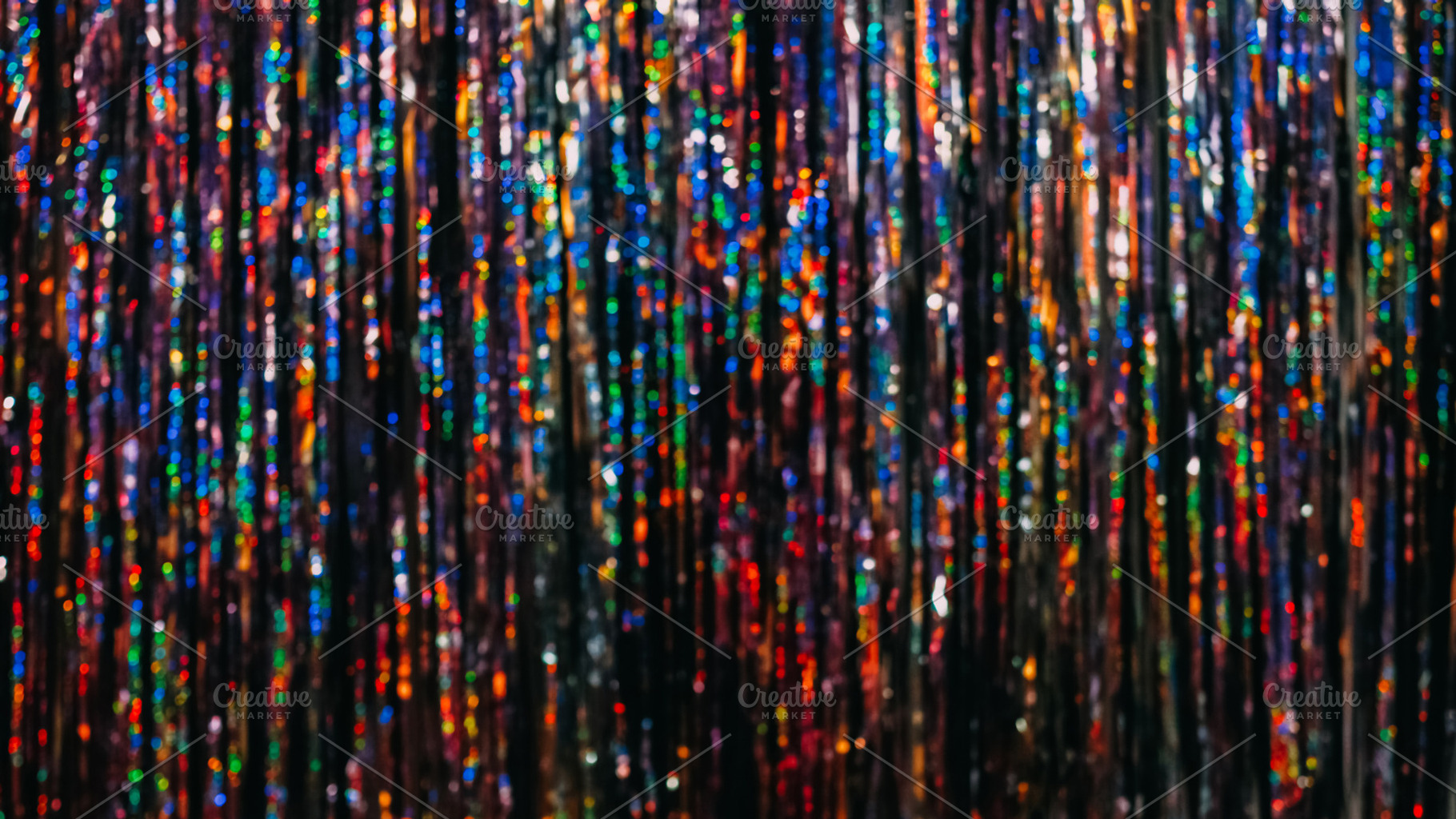 Festive tinsel texture bokeh light blur background, a Background Photo by Photo Drive Studio