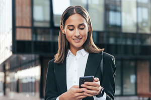 Smiling confident woman in formal, a Business Photo by Artem Varnitsin