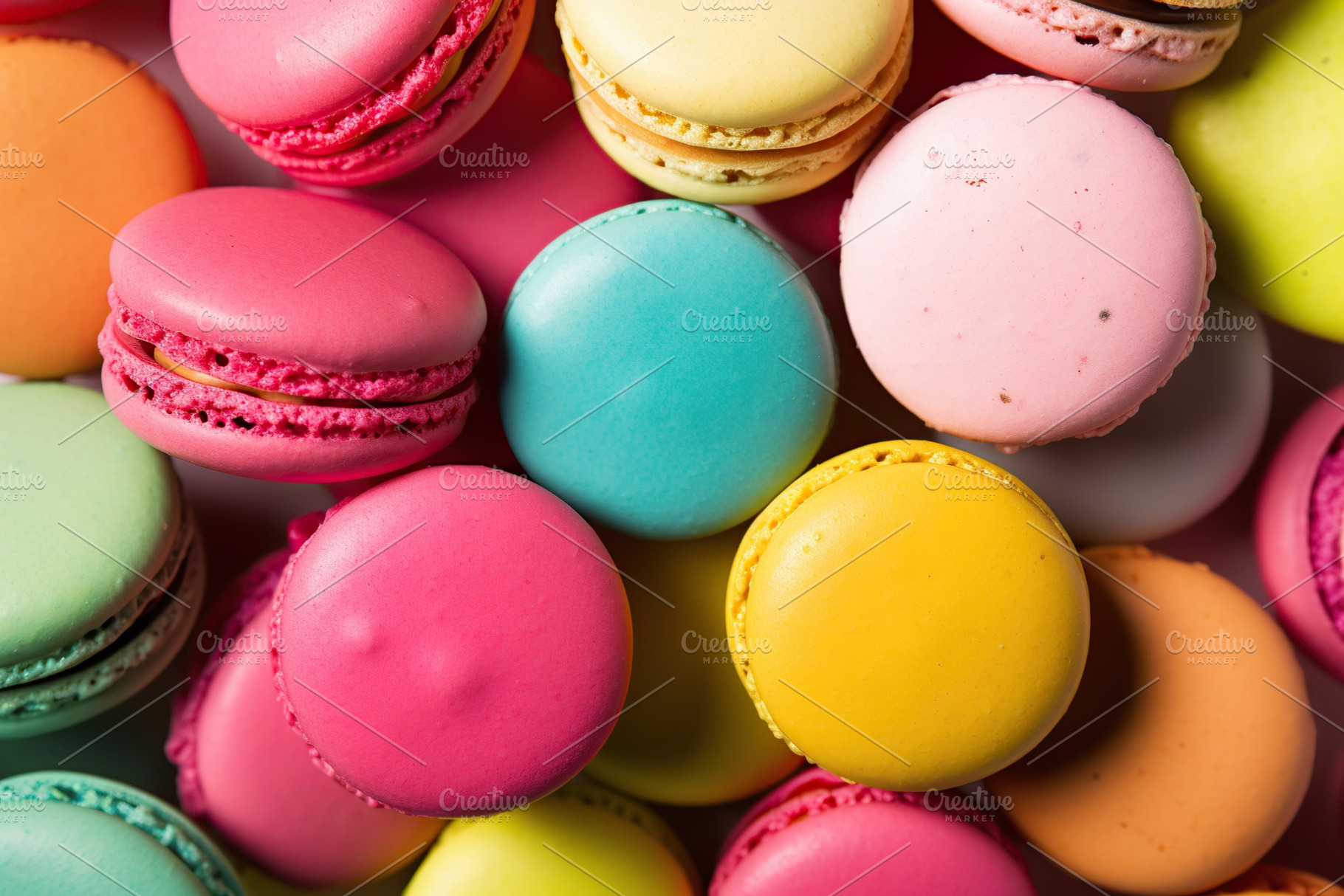 Colorful macarons dessert background, a Food & Drink Photo by AlyaAnd