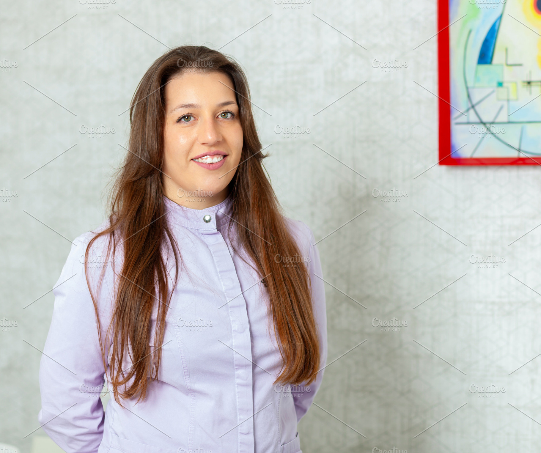 Young female doctor smiling confidently in her office, a Health & Medical Photo by Antonio Gravante Market