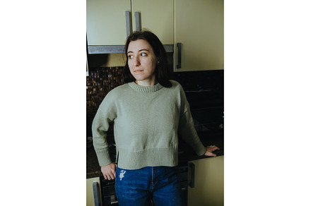 Young beautiful modern woman stands, a Person Photo by zheckasmk