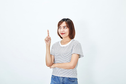 Portrait of smiling attractive asian female in casual t-shirt po, a Person Photo by 1981 Rustic studio kan