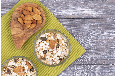 Top view of granola with nuts and, a Food & Drink Photo by Diary of impressions