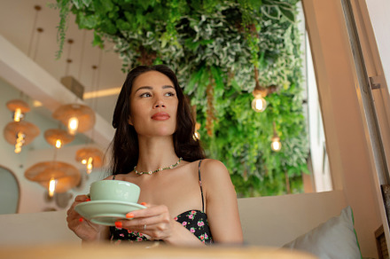 Beautiful girl drinking coffee