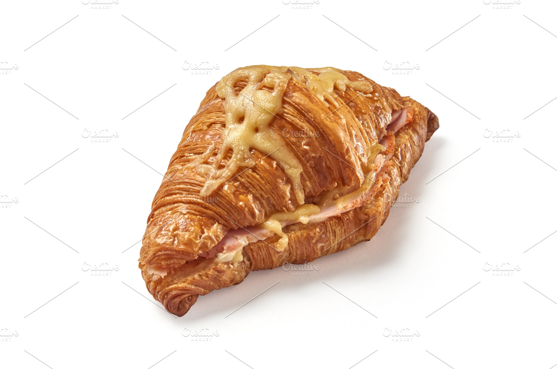 Homemade delicious cut croissant, a Food & Drink Photo by Yaroslav Danylchenko