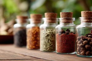 Glass jars filled with dried spices, a Food & Drink Photo by MistyDay
