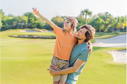 Father and son in the park, the boy