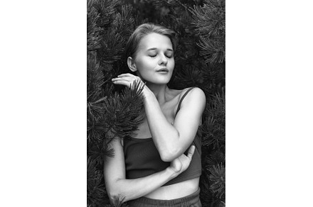 Woman with eyes closed posing