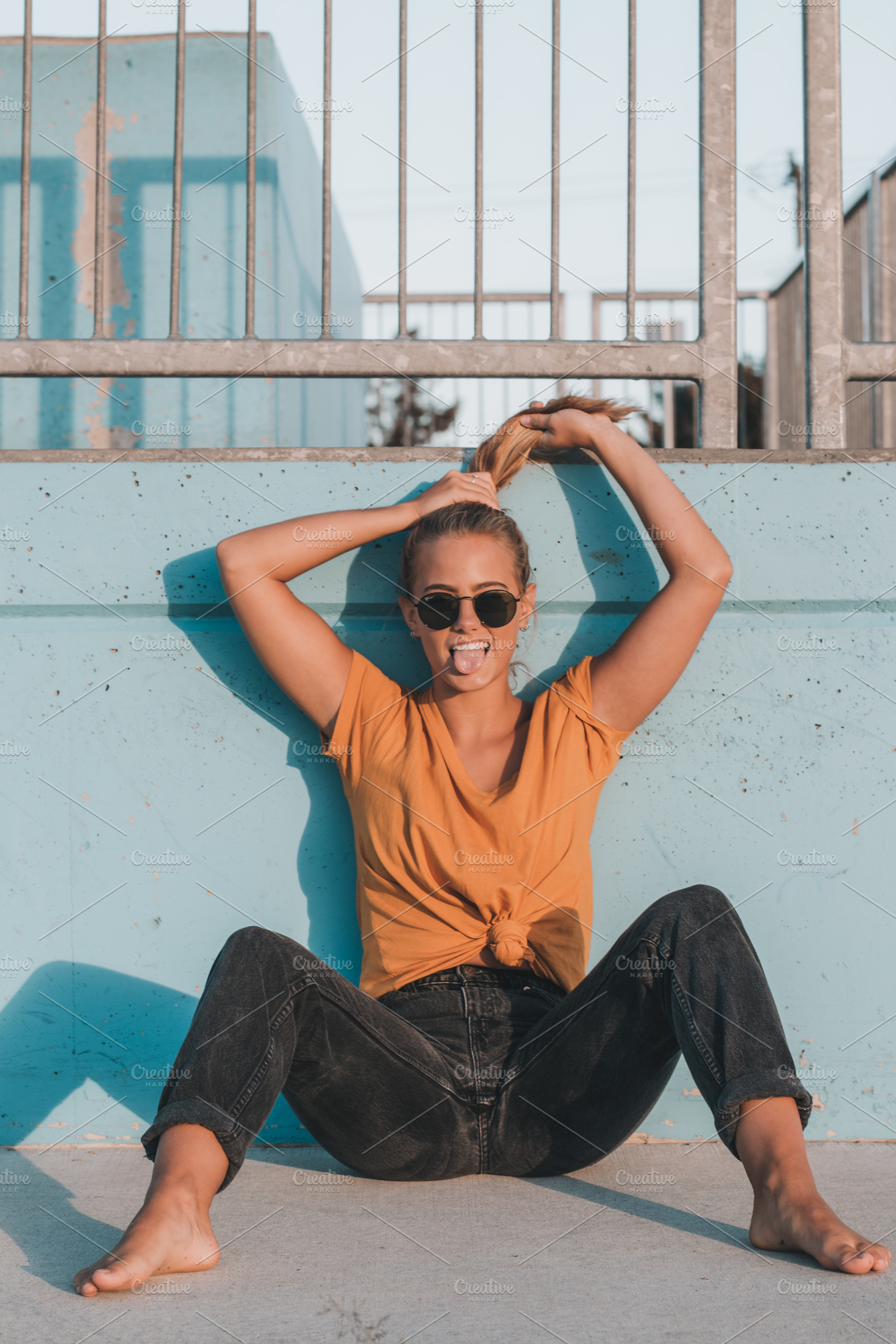 Young female model wearing yellow stock photo containing skate and park, a Person Photo by Chris Joel Campbell