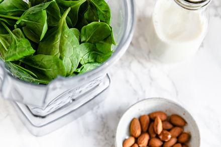 spinach in blender with almond milk