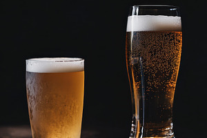 Beer Glasses Arranged on a Table, a Food & Drink Photo by Virgo Studio