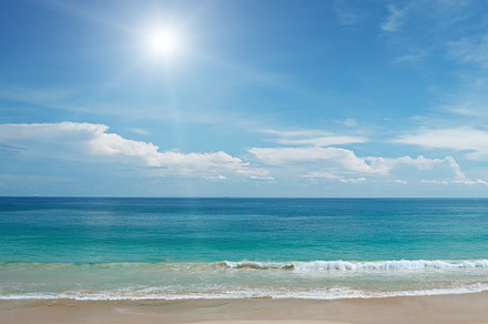 Sandy beach and sun in blue sky, a Nature Photo by Serg64