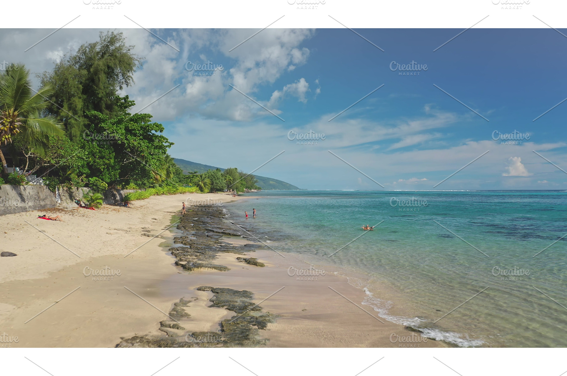 Tourists relaxing on tropical beach, a Nature Photo by Goinyk