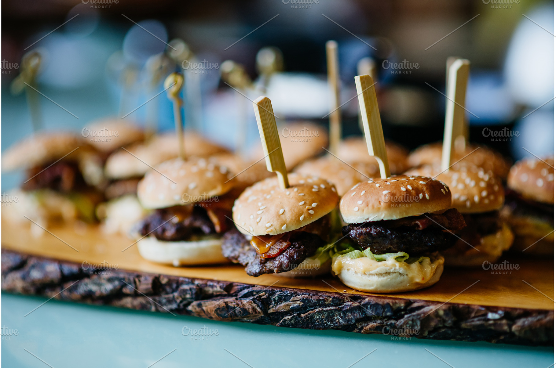 Mini burgers served on buffet table, a Food & Drink Photo by HalfPoint