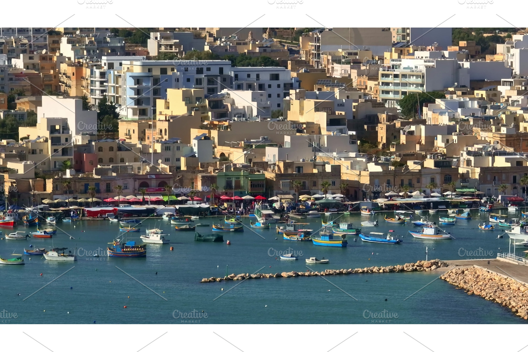 Marsaxlokk Harbour in Malta hosting, a Nature Photo by Goinyk