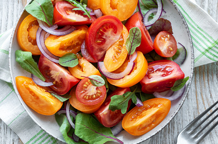 Green salad from leaves and tomatoes, a Food & Drink Photo by Olena Rudo