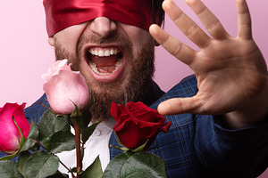 Blindfolded Man With Roses, a Person Photo by Ales Munt