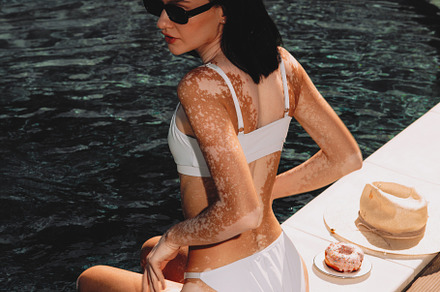 Beautiful girl by the pool, a Person Photo by BUTKO Magazine