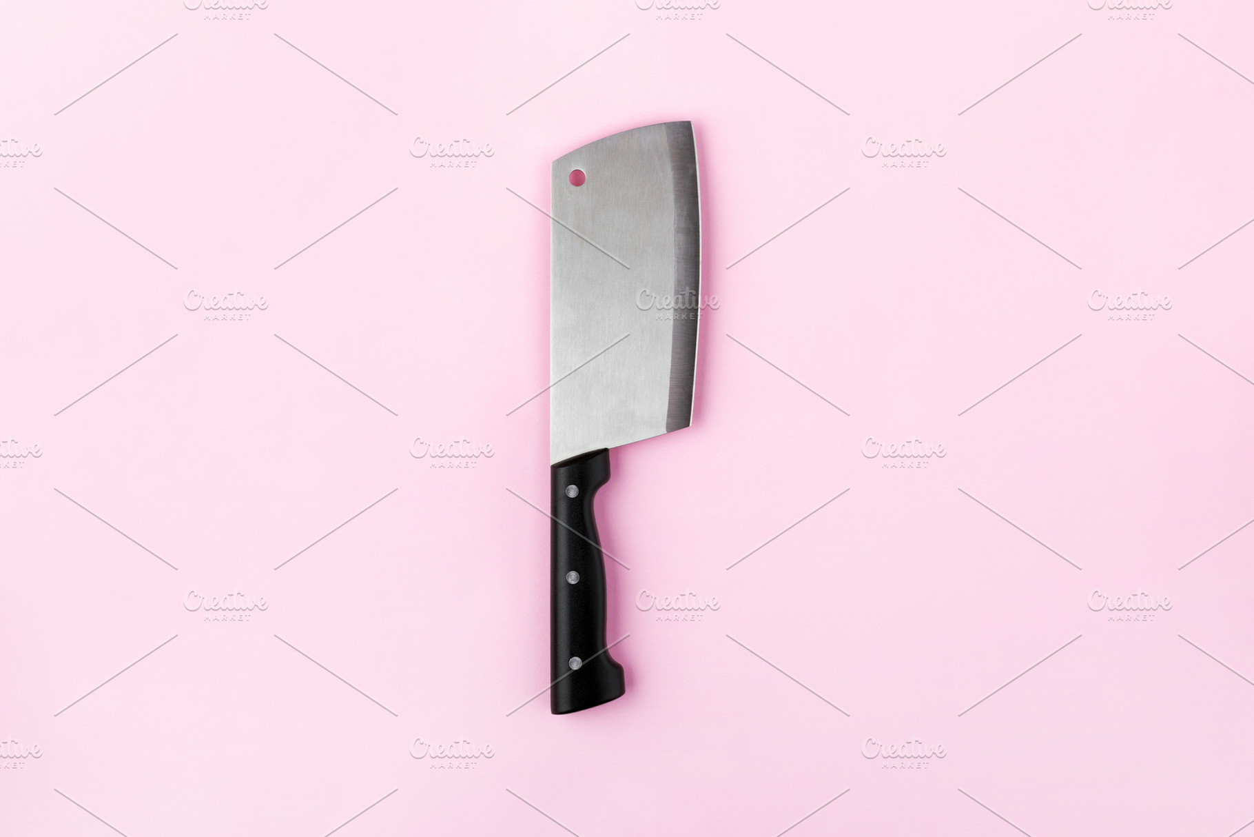 Stainless steel cleaver knife with black handle isolated on past, a Food & Drink Photo by Ales Munt
