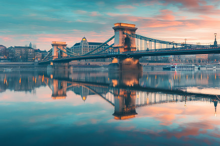 A tranquil sunset illuminates the Ch, a Photo by Tanuart