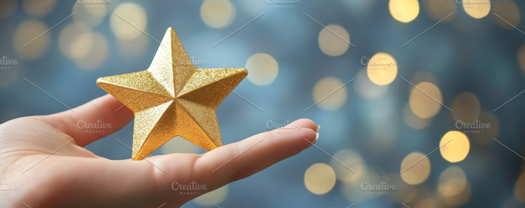 Hand holding a glittering golden star against blurred lights, an Abstract Photo by Natalia Klenova's Shop