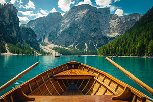 Beautiful view with high mountains, a Transportation Photo by Alpine Dreams