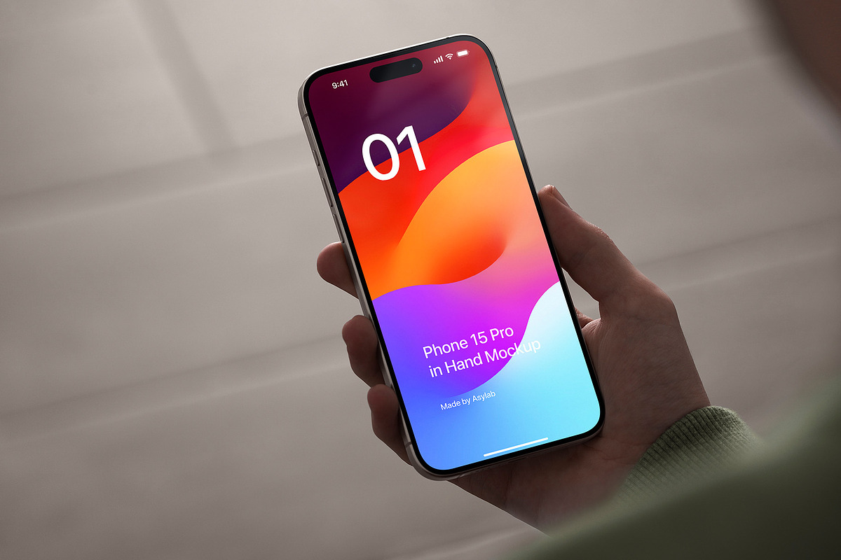 Phone 15 Pro Mockup in Hand, an iPhone Mockup by Asylab (Photo 1 of 4)