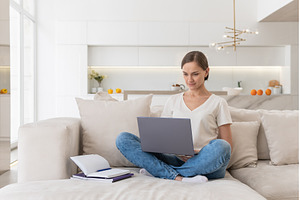 Young woman working on a laptop at