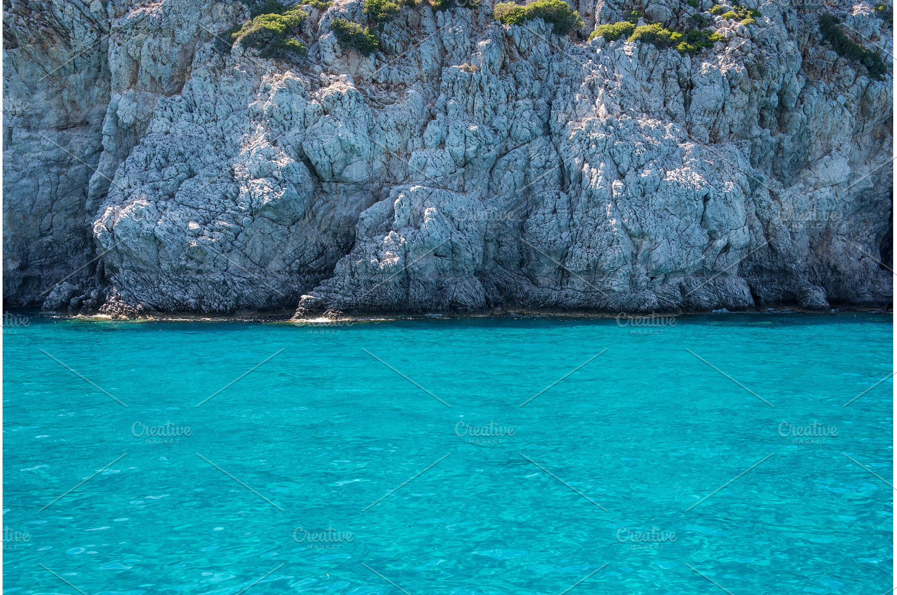Sea and beach in Anthony Quinn bay, a Nature Photo by COLORFUL