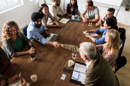 Diverse group of people in a seminar featuring person, collaboration, and, a Person Photo by rawpixel