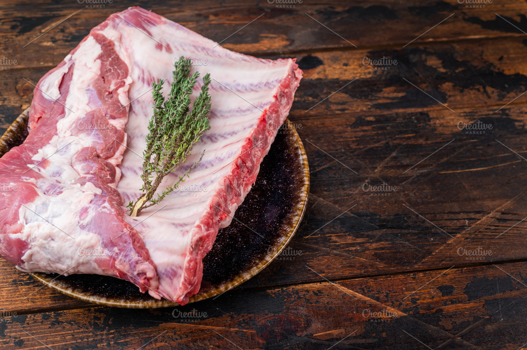 Raw pork spareribs rack with knife and herbs flat lay premium me, a Food & Drink Photo by composter-box@mail.ru