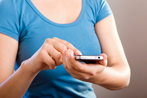 Woman Using Smartphone, a Person Photo by THP Creative