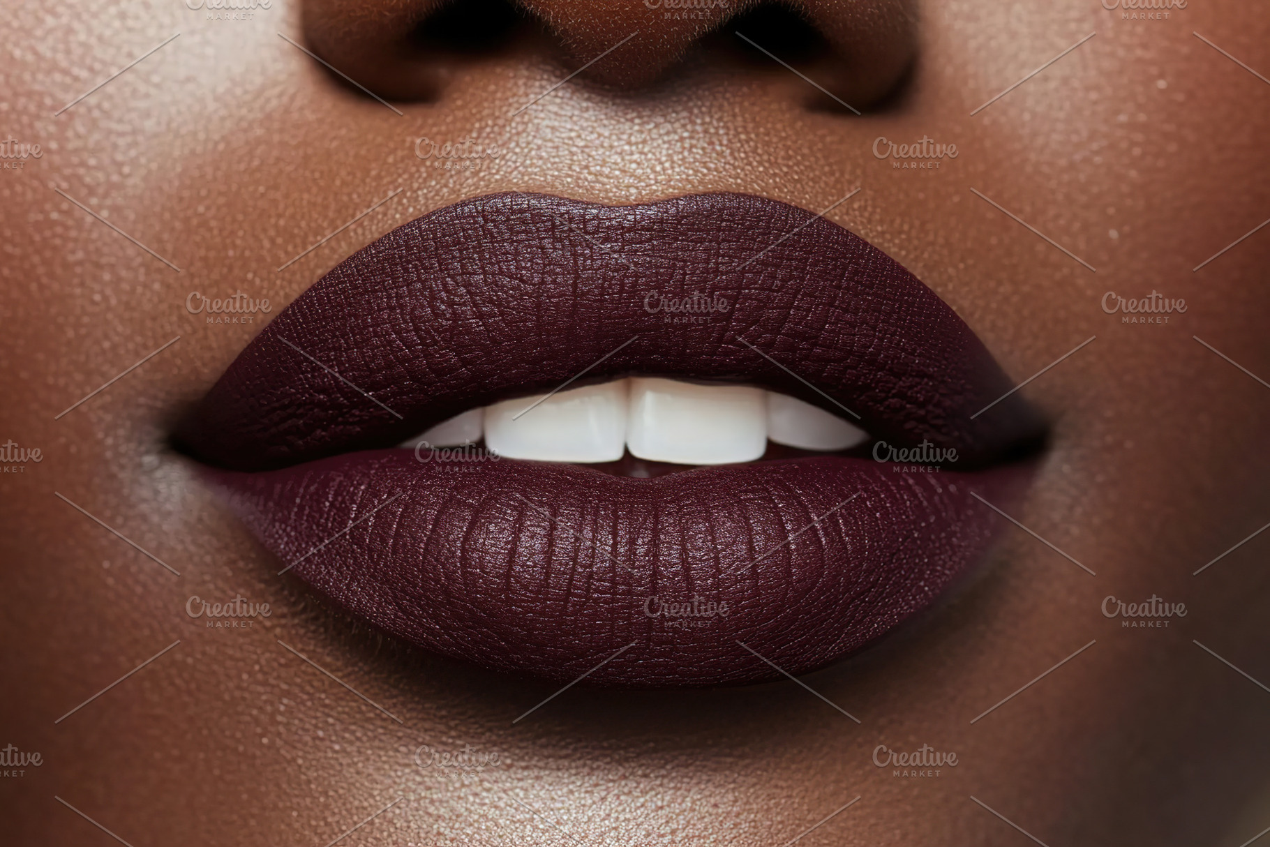 Closeup of soft lips adorned with deep lip gloss revealing a perfect smile, a Beauty & Fashion Photo by AlyaAnd