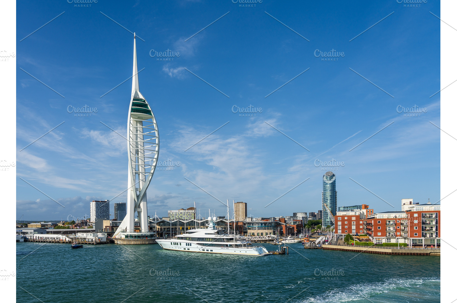 Spinnaker tower overlooks the harbor, an Architecture Photo by Backyard Stock