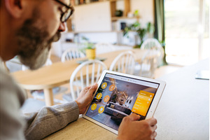 Man using smart home control panel., a Technology Photo by HalfPoint