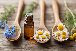 Glass bottle of essential oil with, a Health & Medical Photo by MistyDay