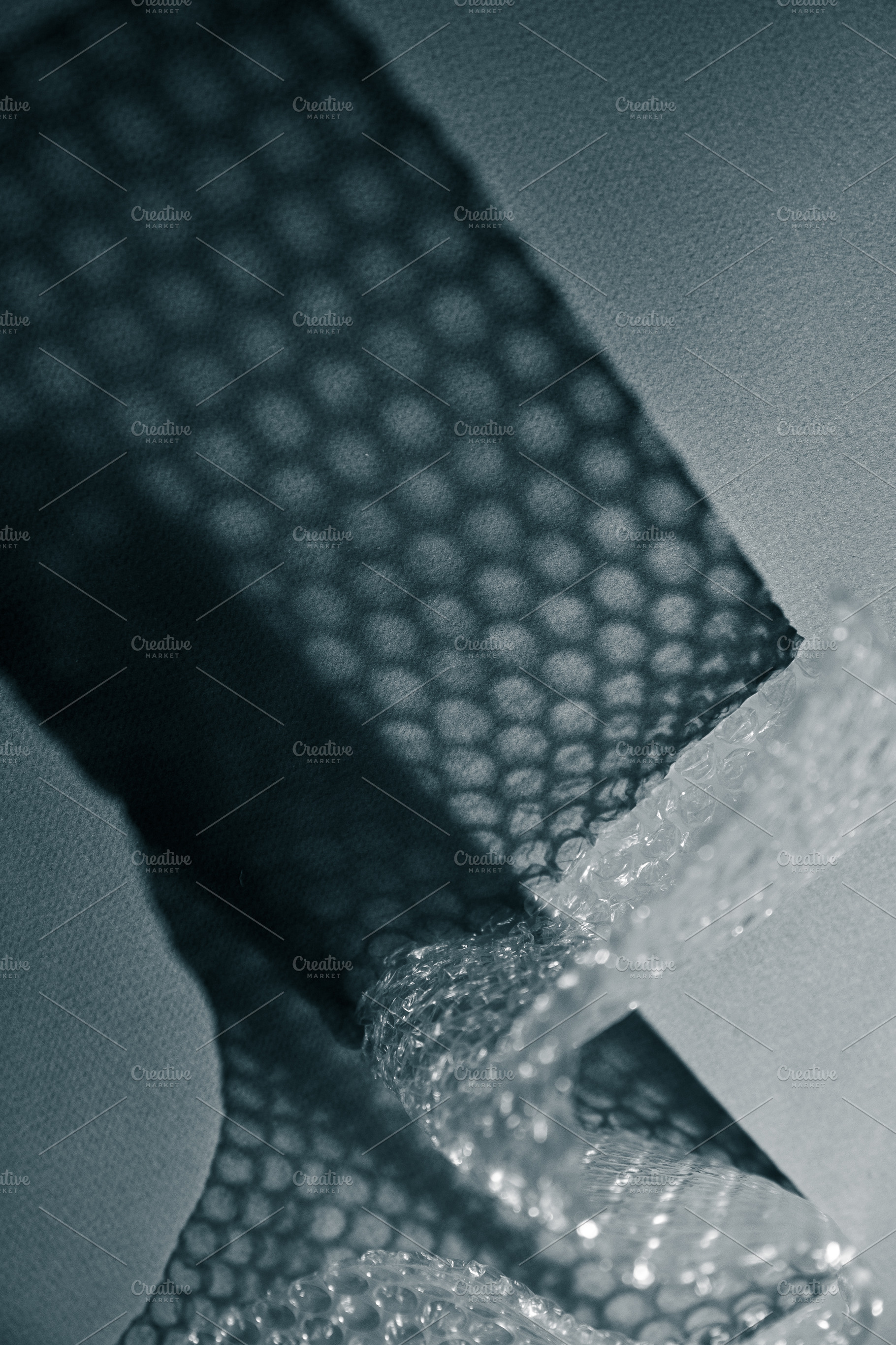 Close up of bubble wrap casting geom, an Abstract Photo by Edalin's Store