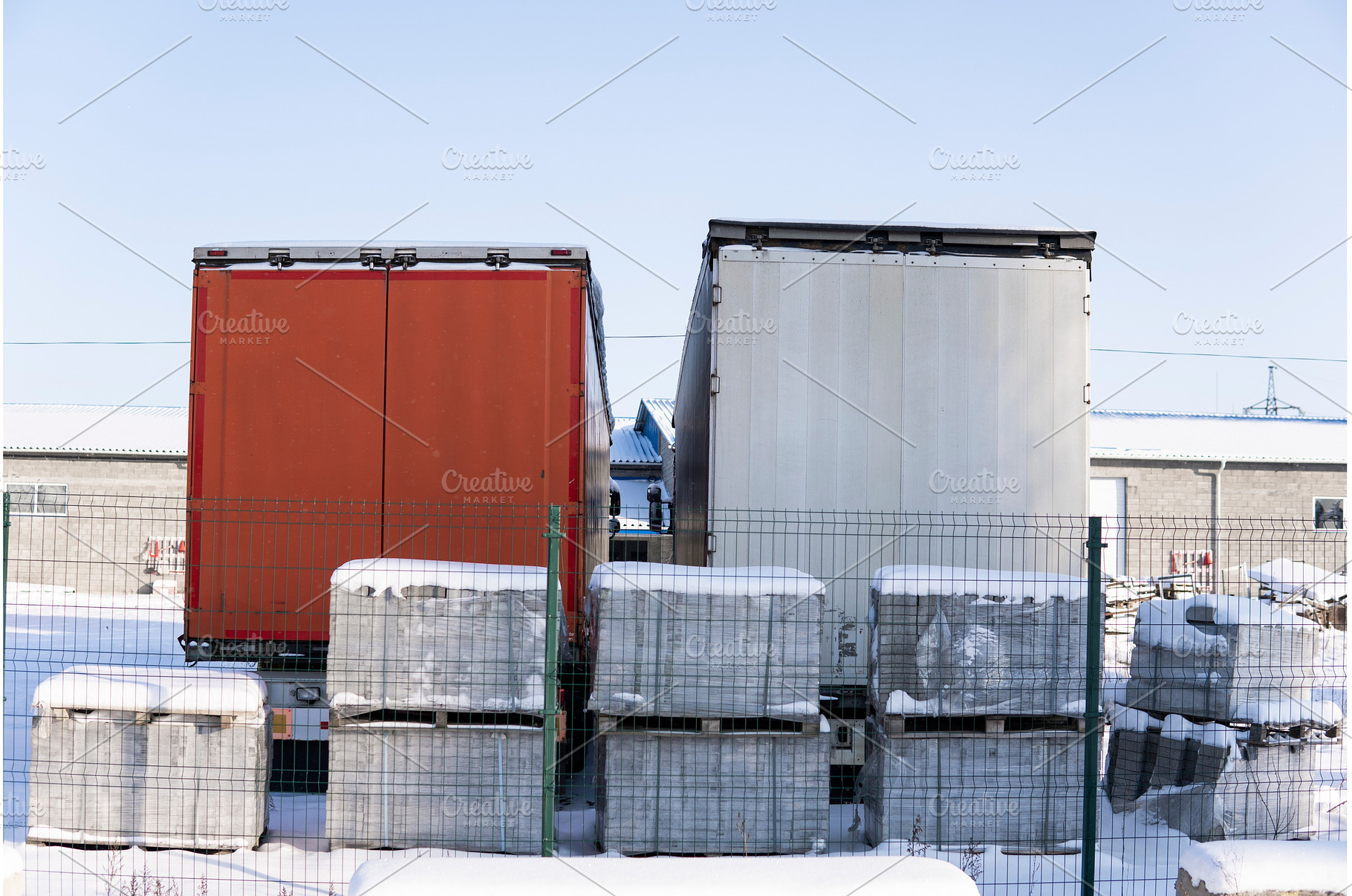Two truck trailers in snowy, a Transportation Photo by volodymyrshtun13795