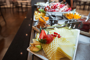 Cheese platter at buffet table, a Food & Drink Photo by SkyNext